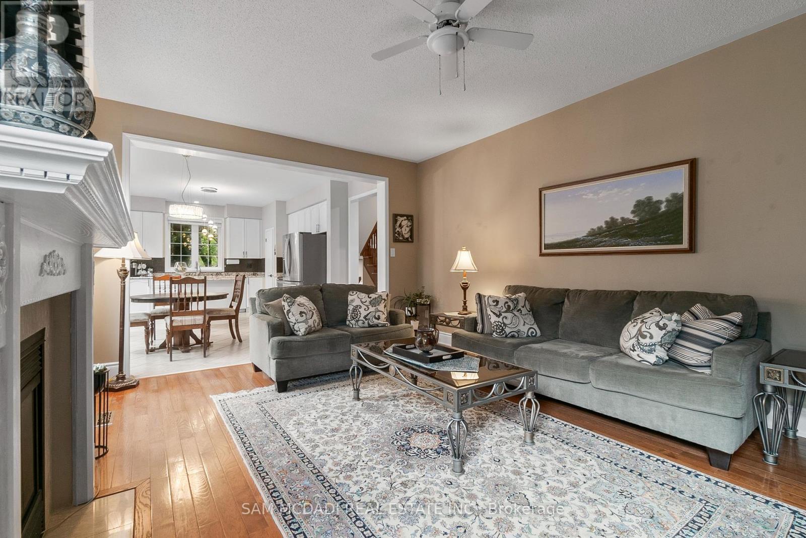 3859 Pondview Way, Mississauga, ON - Indoor Photo Showing Living Room With Fireplace
