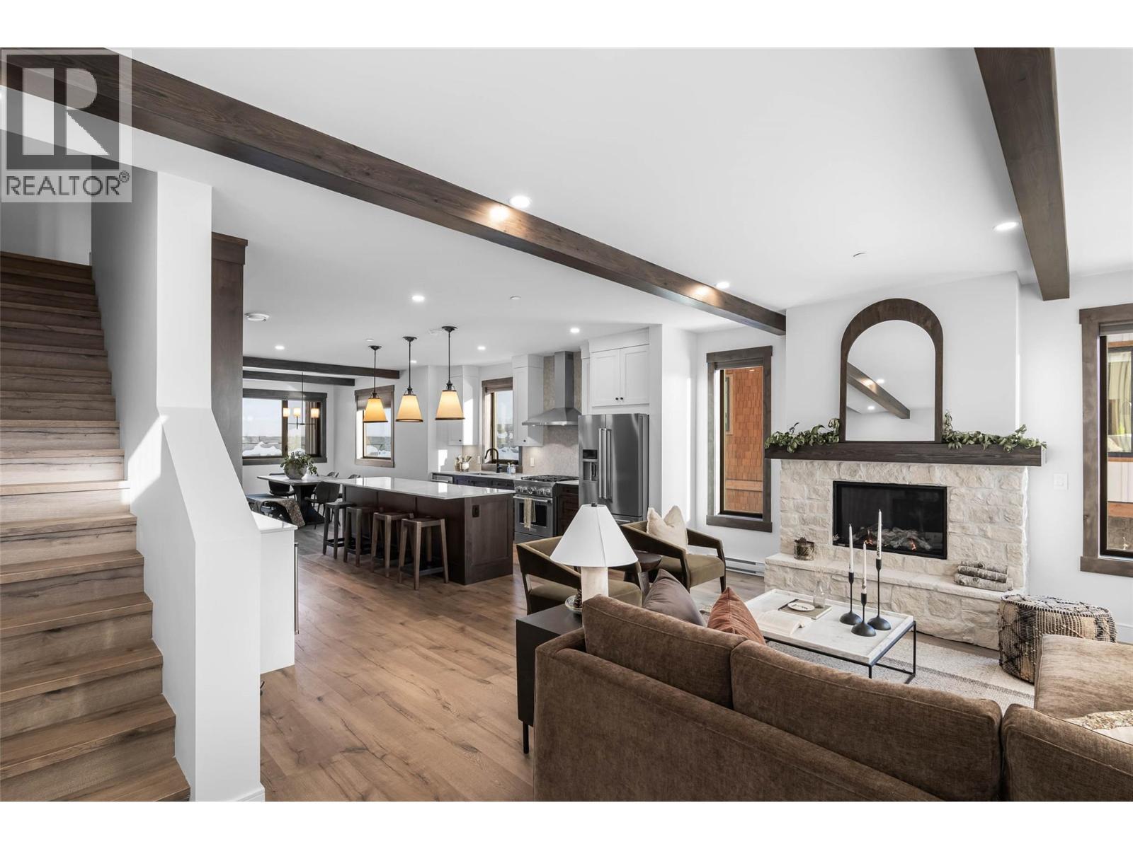 7000 Mcgillivray Lake Drive Unit# 13, Sun Peaks, BC - Indoor Photo Showing Living Room With Fireplace