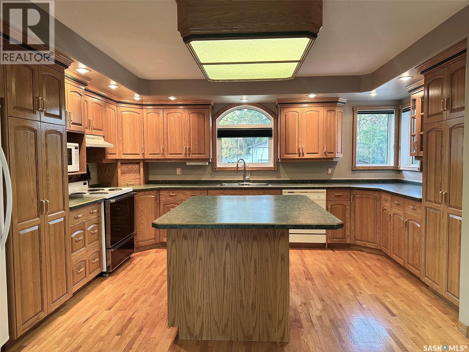 South Acreage Hudson Bay, Hudson Bay, SK - Indoor Photo Showing Kitchen With Double Sink