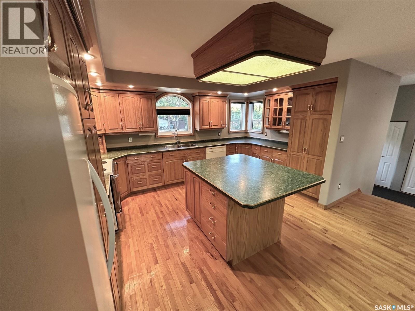 South Acreage Hudson Bay, Hudson Bay, SK - Indoor Photo Showing Kitchen With Double Sink