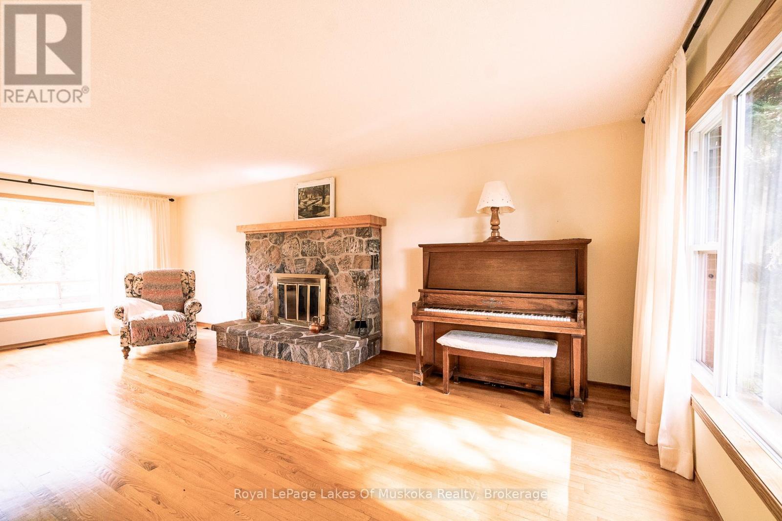 96 520 Highway W, Armour, ON - Indoor Photo Showing Living Room With Fireplace