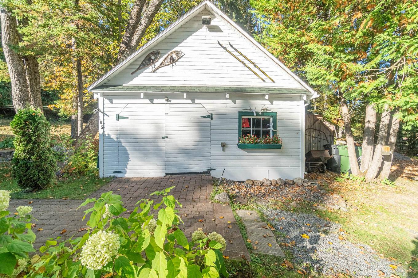 Garage - 165 Ch. Paquette, Mont-Tremblant, QC - Outdoor With Exterior