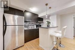 Full Kitchen with counter & SS Appliances -