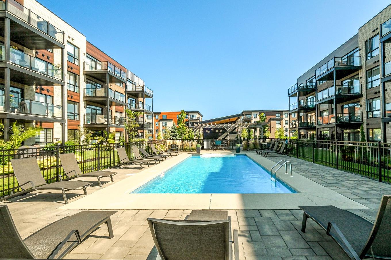 Pool - 306-3675 Rue Roland-Marquette, Longueuil (Saint-Hubert), QC - Outdoor With In Ground Pool