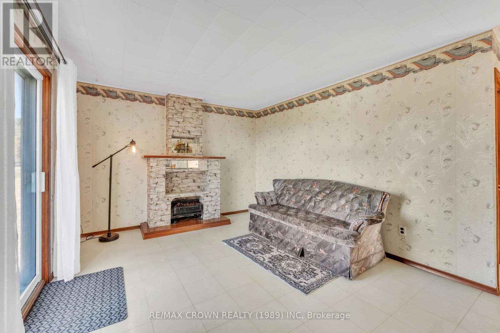 936 Laplante Road, Bonfield, ON - Indoor With Fireplace