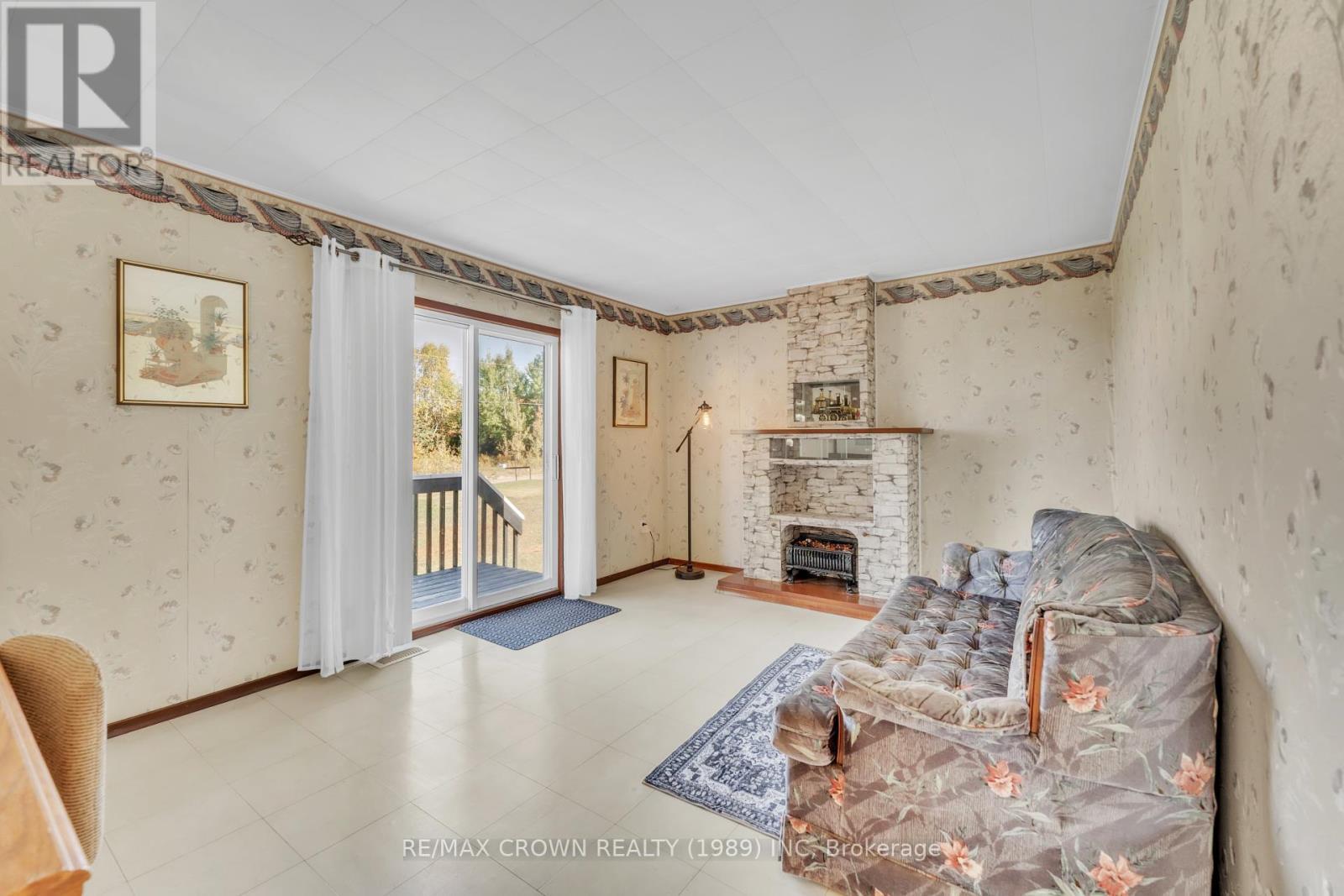 936 Laplante Road, Bonfield, ON - Indoor With Fireplace