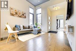 Entrance foyer featuring light wood finished floors and baseboards -