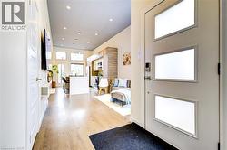 Entrance foyer featuring light wood-style flooring and recessed lighting -