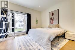 Bedroom with light wood-style flooring -