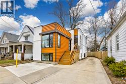 Modern home with concrete driveway -