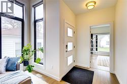 Foyer entrance featuring baseboards and light wood finished floors -