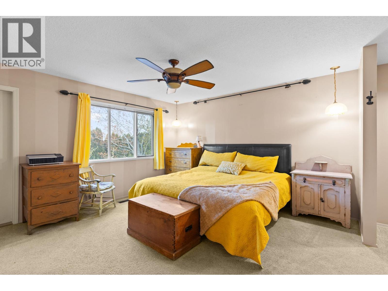 230 Cypress Drive, Coldstream, BC - Indoor Photo Showing Bedroom