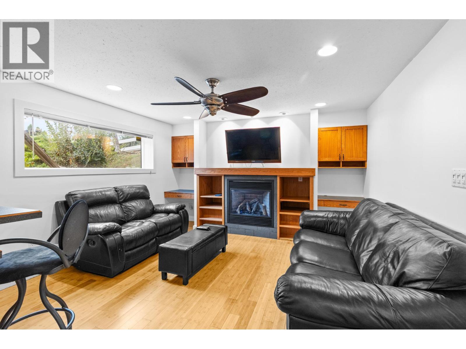 230 Cypress Drive, Coldstream, BC - Indoor Photo Showing Living Room With Fireplace