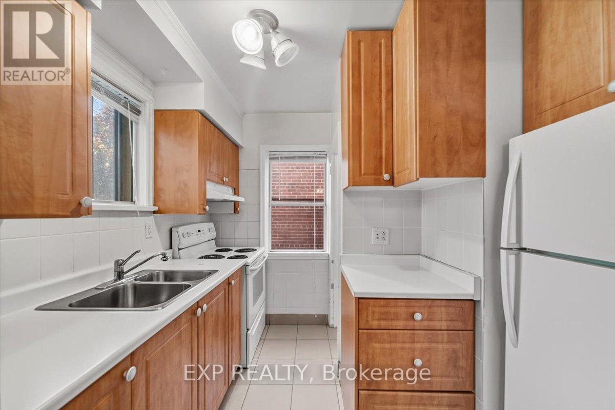 16 King Georges Drive W, Toronto, ON - Indoor Photo Showing Kitchen With Double Sink