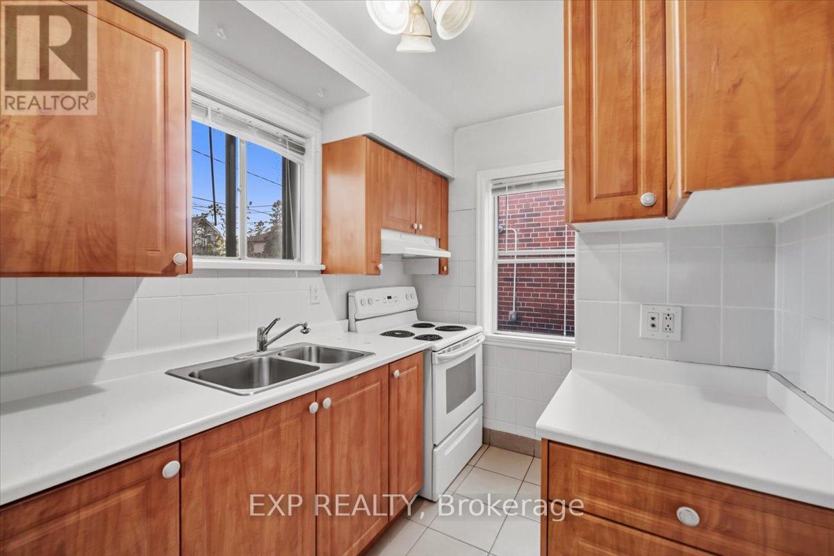 16 King Georges Drive W, Toronto, ON - Indoor Photo Showing Kitchen With Double Sink