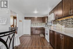 Kitchen w/ appliances -