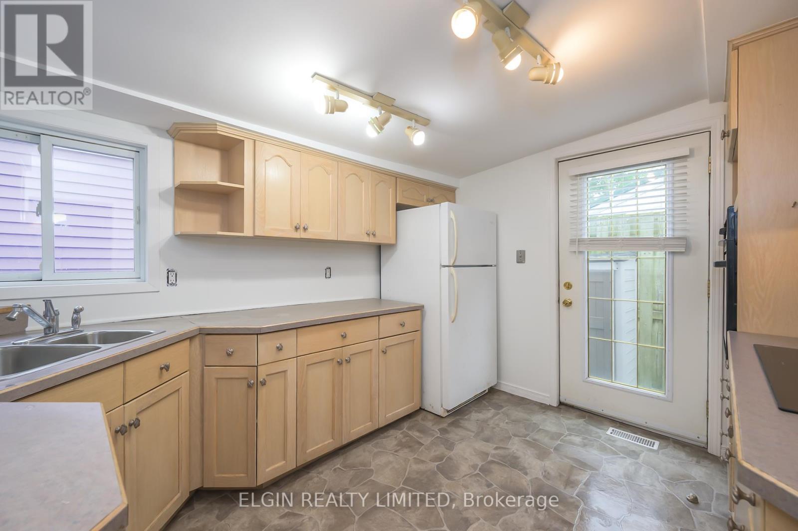 159 William Street, Central Elgin, ON - Indoor Photo Showing Kitchen With Double Sink