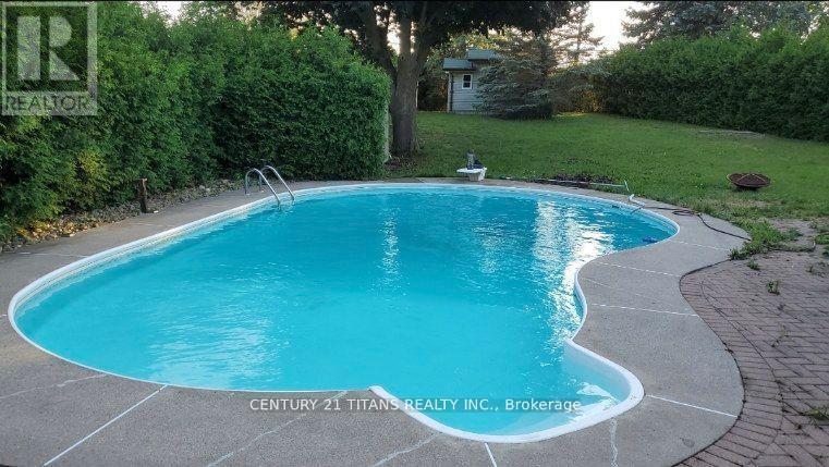 Main - 349 Carnaby Court, Oshawa, ON - Outdoor With In Ground Pool With Backyard