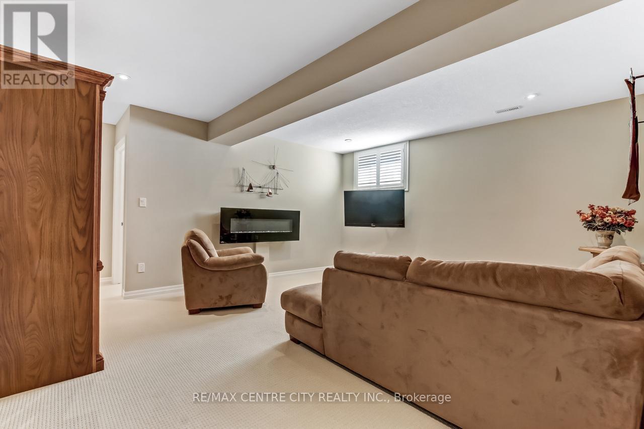 8 - 234 Peach Tree Boulevard, St. Thomas, ON - Indoor With Fireplace