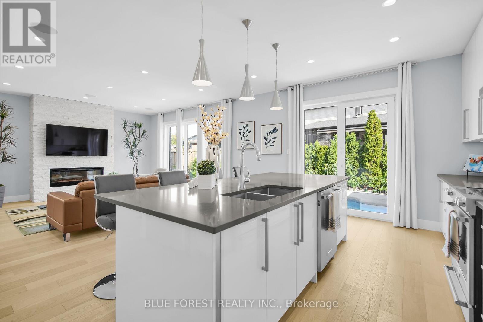 2190 Bakervilla Street, London South (South V), ON - Indoor Photo Showing Kitchen With Fireplace With Double Sink With Upgraded Kitchen