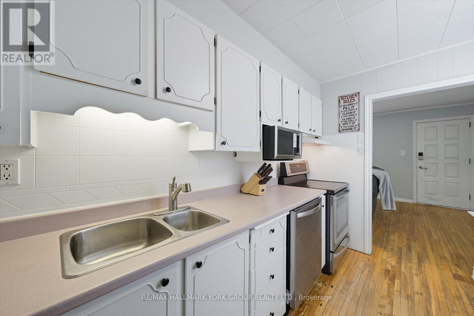 24 Churchill Crescent, Kawartha Lakes, ON - Indoor Photo Showing Kitchen With Double Sink