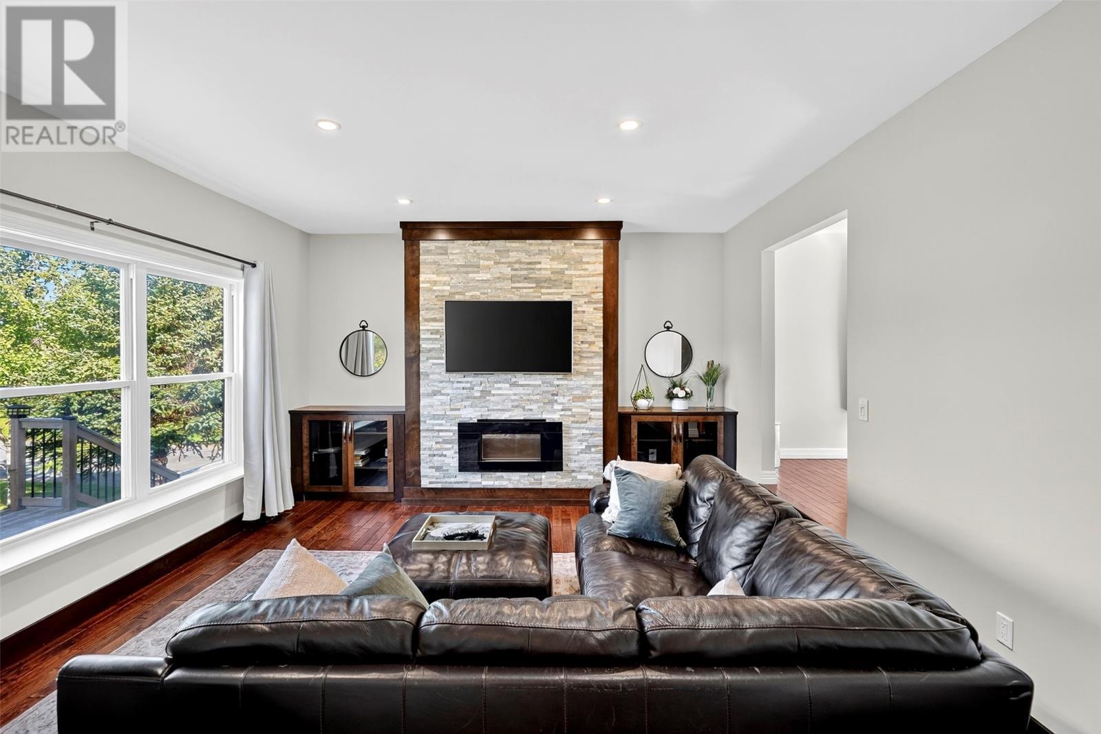 329 Main Road, Long Cove, NL - Indoor Photo Showing Living Room With Fireplace