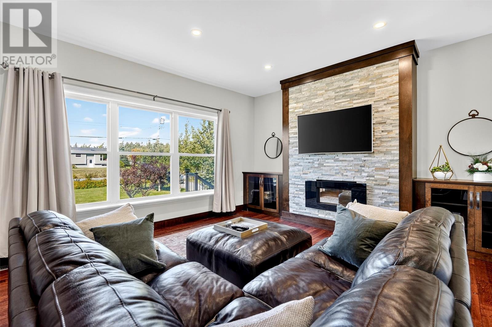 329 Main Road, Long Cove, NL - Indoor Photo Showing Living Room With Fireplace