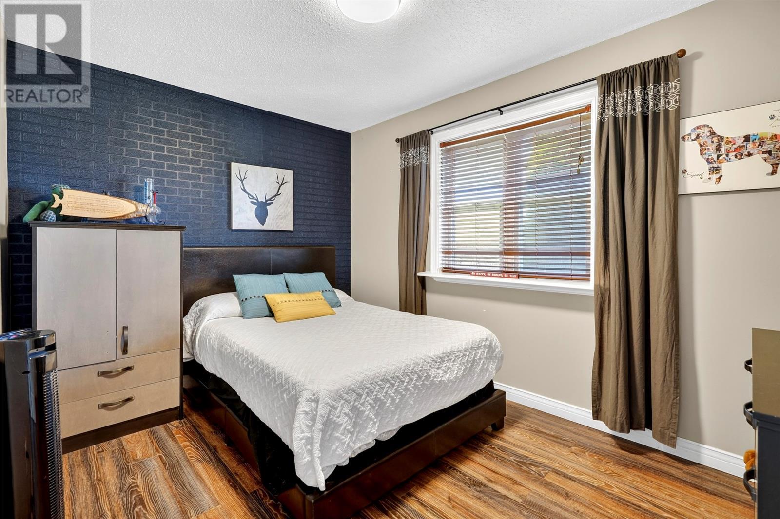 329 Main Road, Long Cove, NL - Indoor Photo Showing Bedroom
