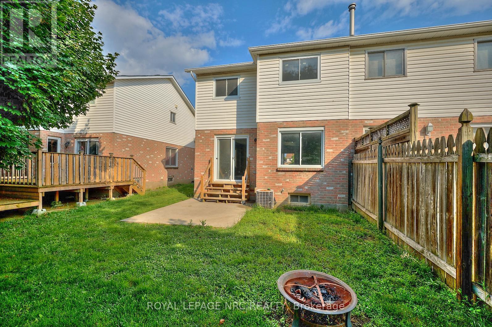 The back of the house. - 14 Buss Court, Thorold (Confederation Heights), ON - Outdoor With Deck Patio Veranda