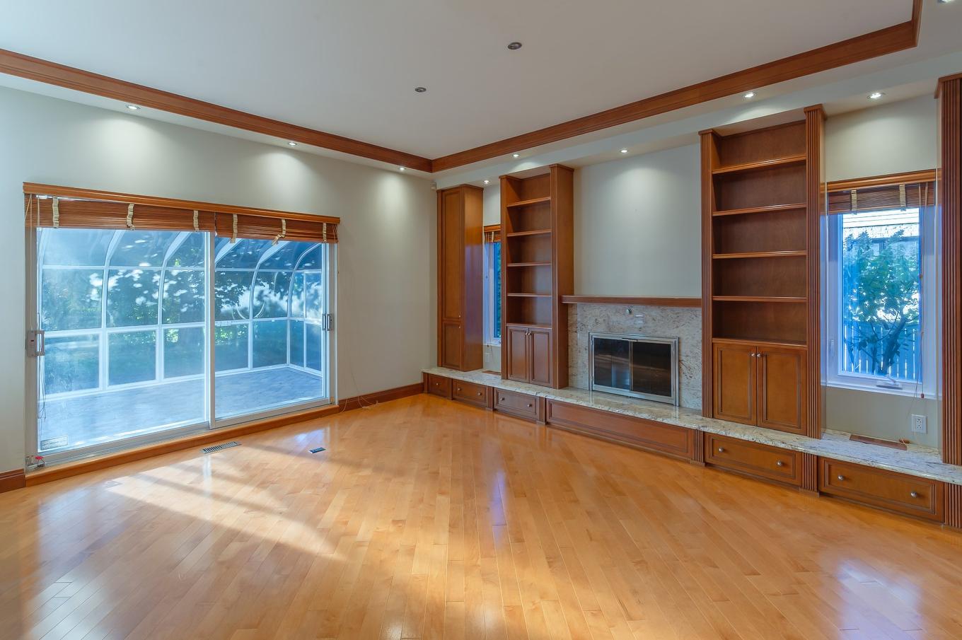 Family room - 8890 Crois. Roussin, Brossard, QC - Indoor Photo Showing Other Room With Fireplace