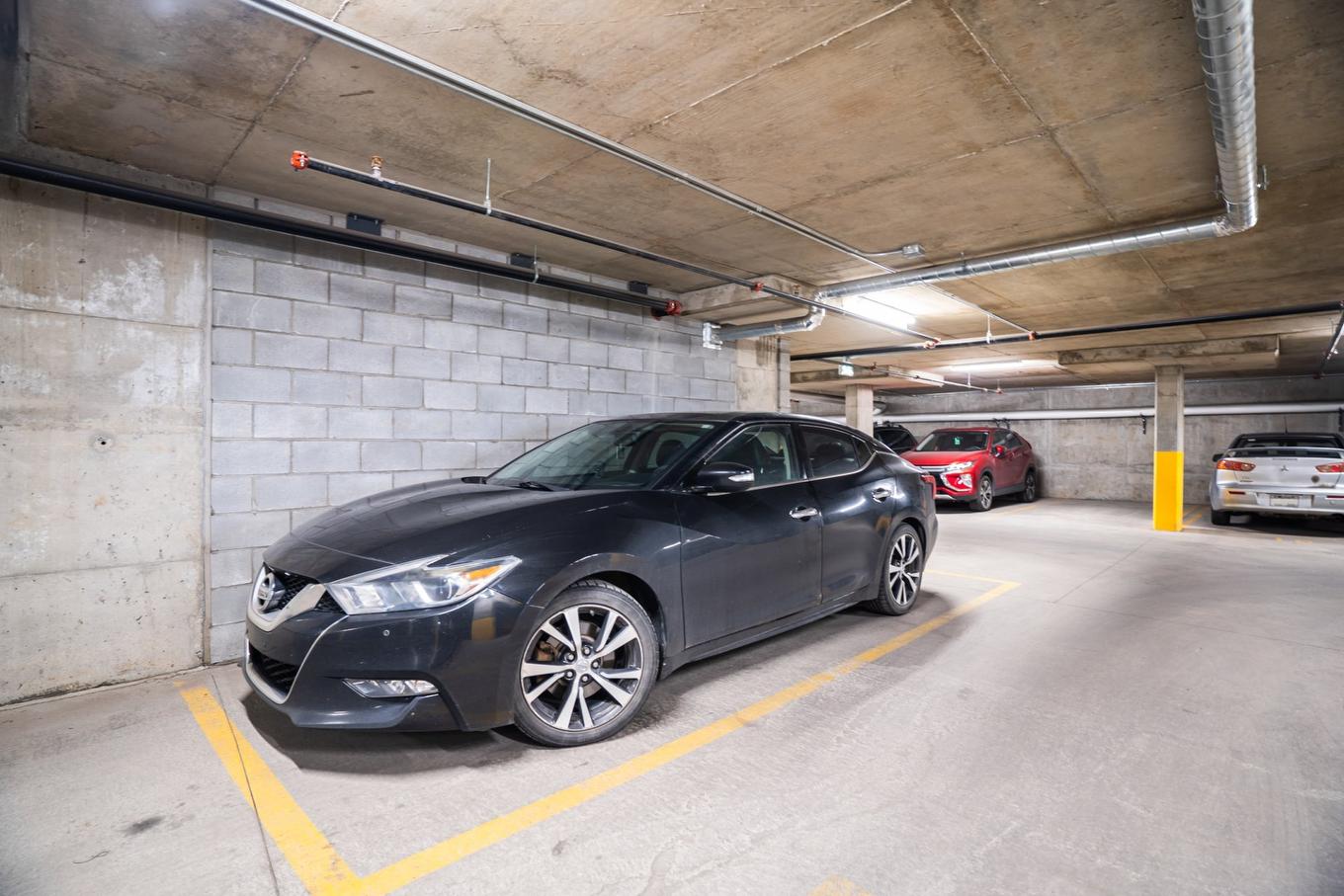 Stationnement - 210-7275 Rue D'Abancourt, Montréal (Saint-Léonard), QC - Indoor Photo Showing Garage