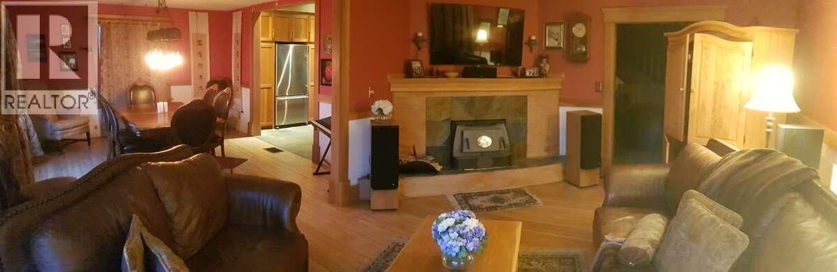 13606 Cooke Avenue, Summerland, BC - Indoor With Fireplace