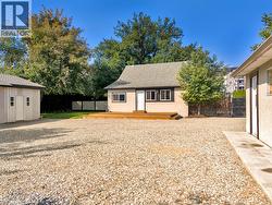 Which faces towards both shops -