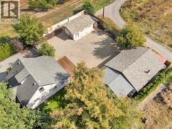 Secluded property with trees surrounding the strucutres -