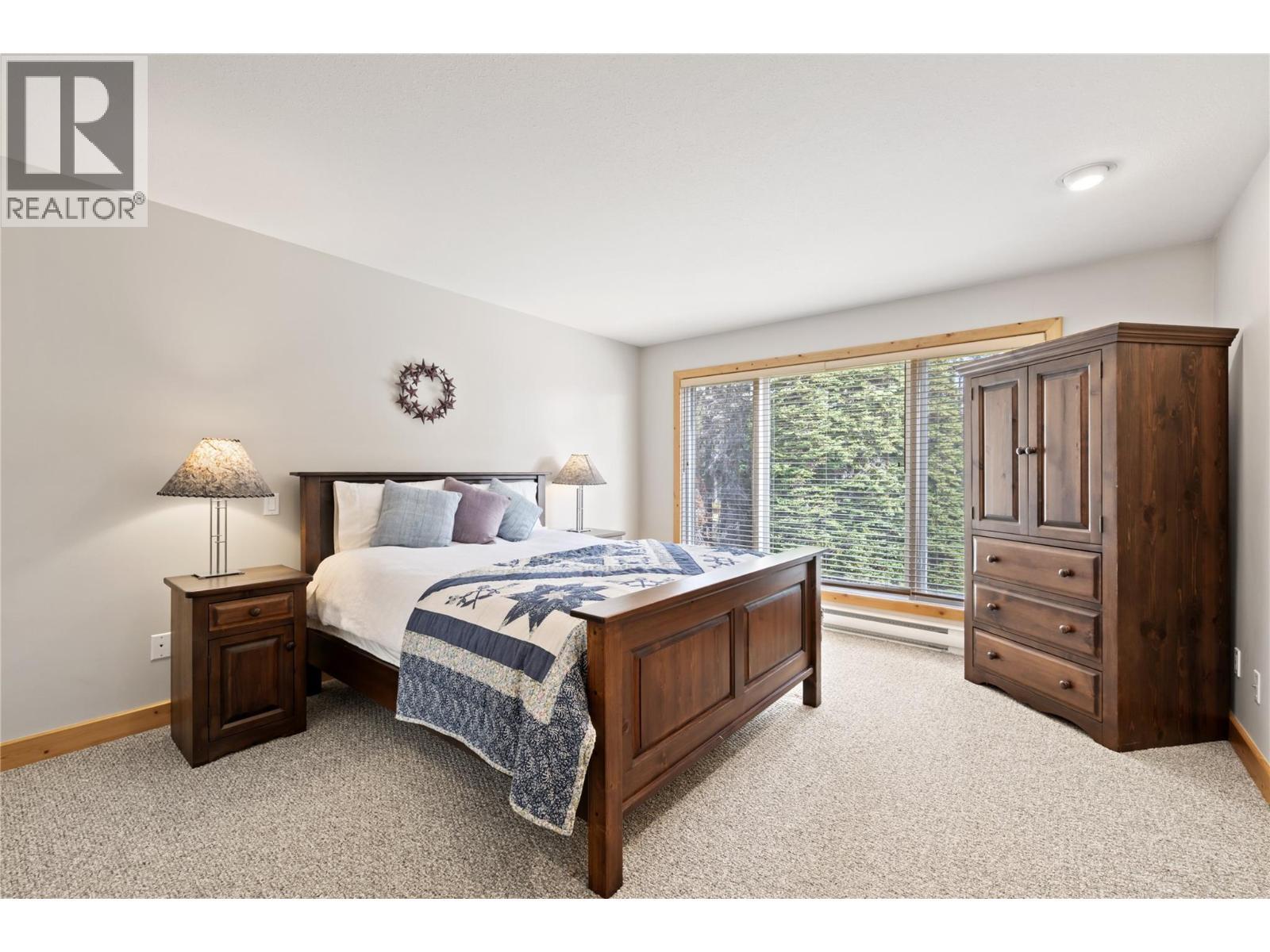5946 Snow Pines Crescent Unit# A, Big White, BC - Indoor Photo Showing Bedroom
