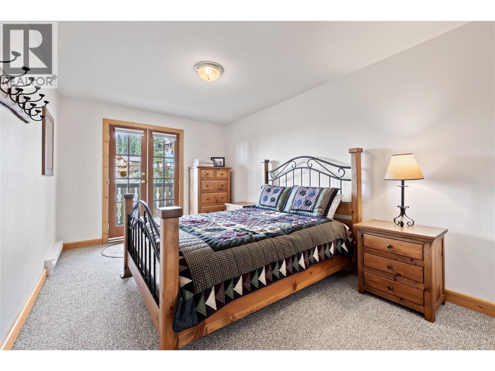 5946 Snow Pines Crescent Unit# A, Big White, BC - Indoor Photo Showing Bedroom