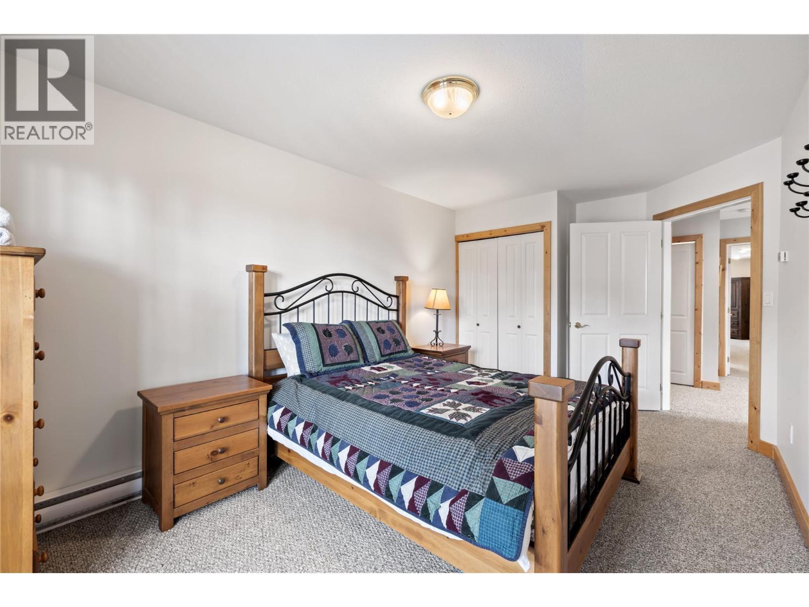 5946 Snow Pines Crescent Unit# A, Big White, BC - Indoor Photo Showing Bedroom