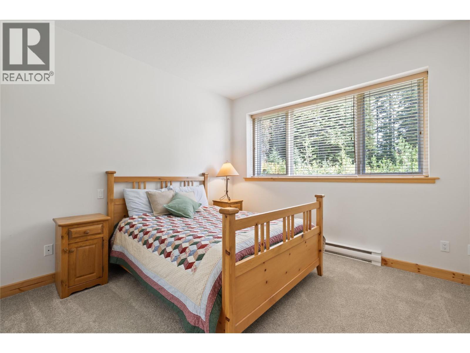 5946 Snow Pines Crescent Unit# A, Big White, BC - Indoor Photo Showing Bedroom