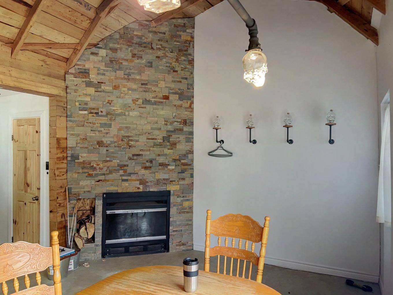 Living room - 1 Rivière Hall, Paspébiac, QC - Indoor Photo Showing Living Room With Fireplace