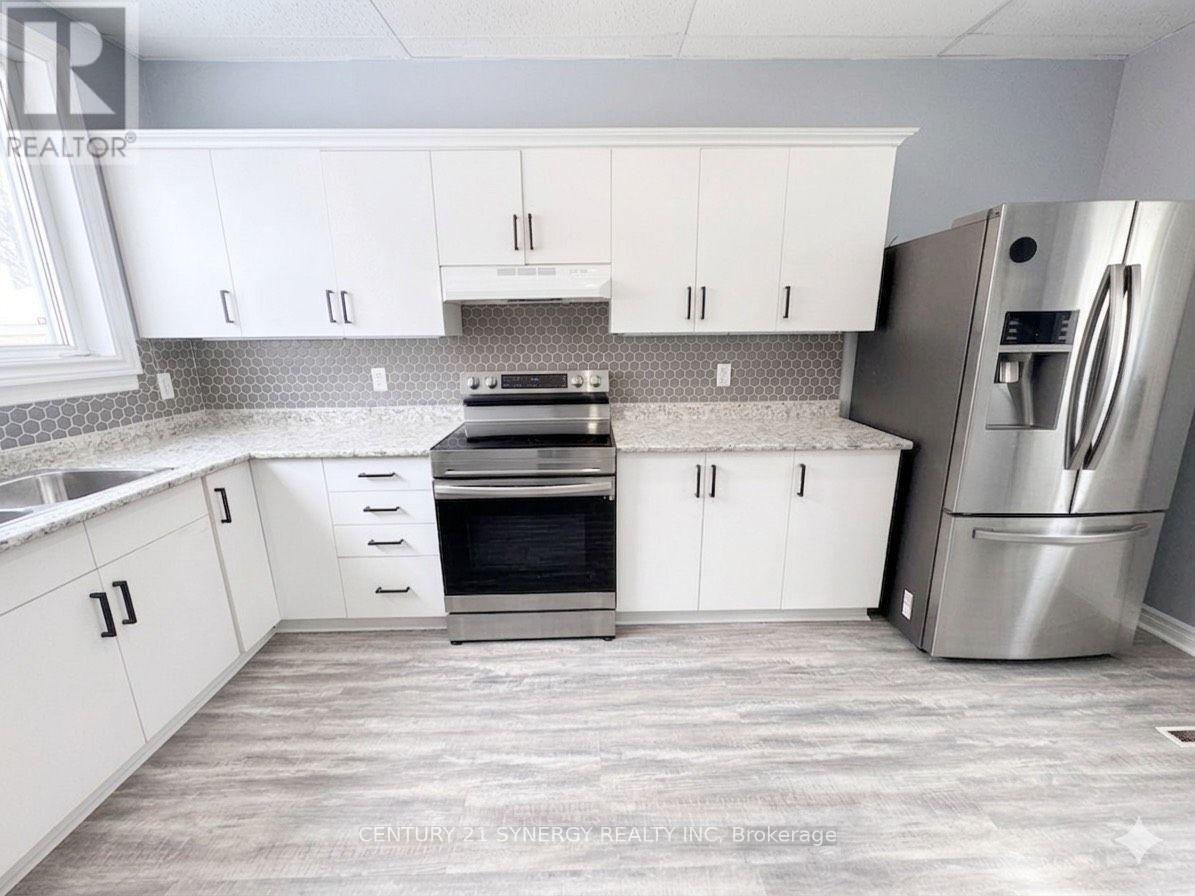 Colour enhanced - 25 Kensington Avenue, Smiths Falls, ON - Indoor Photo Showing Kitchen