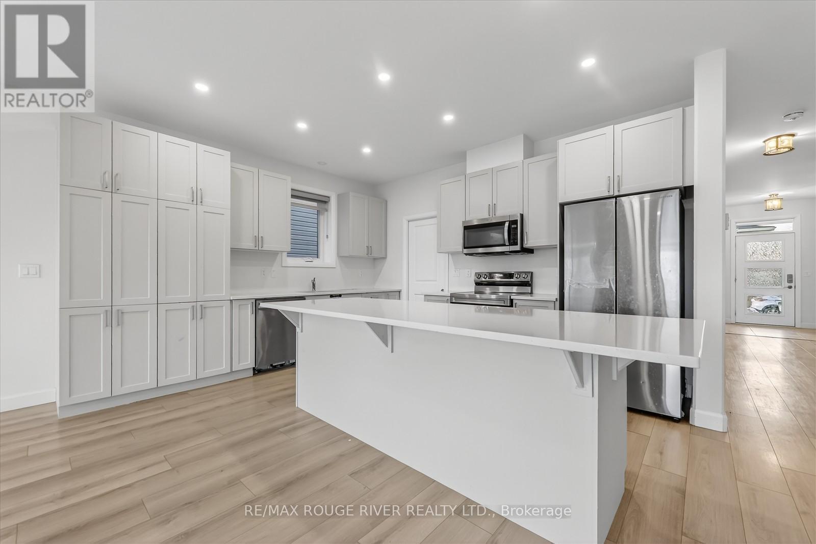 46 Erie Court, Loyalist, ON - Indoor Photo Showing Kitchen With Upgraded Kitchen