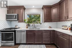 Maple cabinetry, quartz countertops -