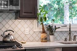 Sleek glass tile backsplash -