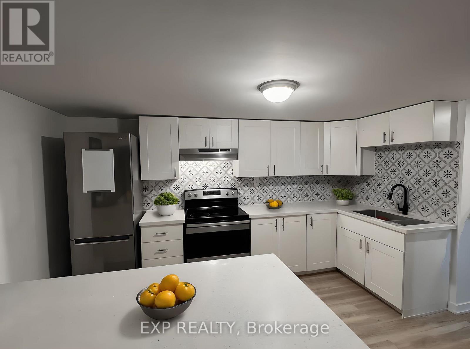 Virtually Staged - Lower - 105 Mill Street, Shelburne, ON - Indoor Photo Showing Kitchen With Double Sink