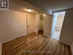 Primary Bedroom w/ Walk-in Closet & Ensuite -