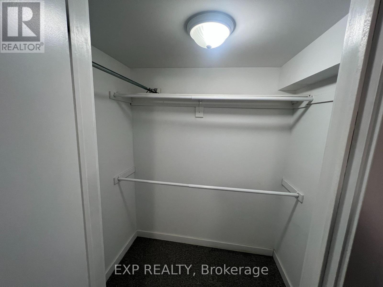 Primary Walk-In Closet - Lower - 105 Mill Street, Shelburne, ON - Indoor With Storage