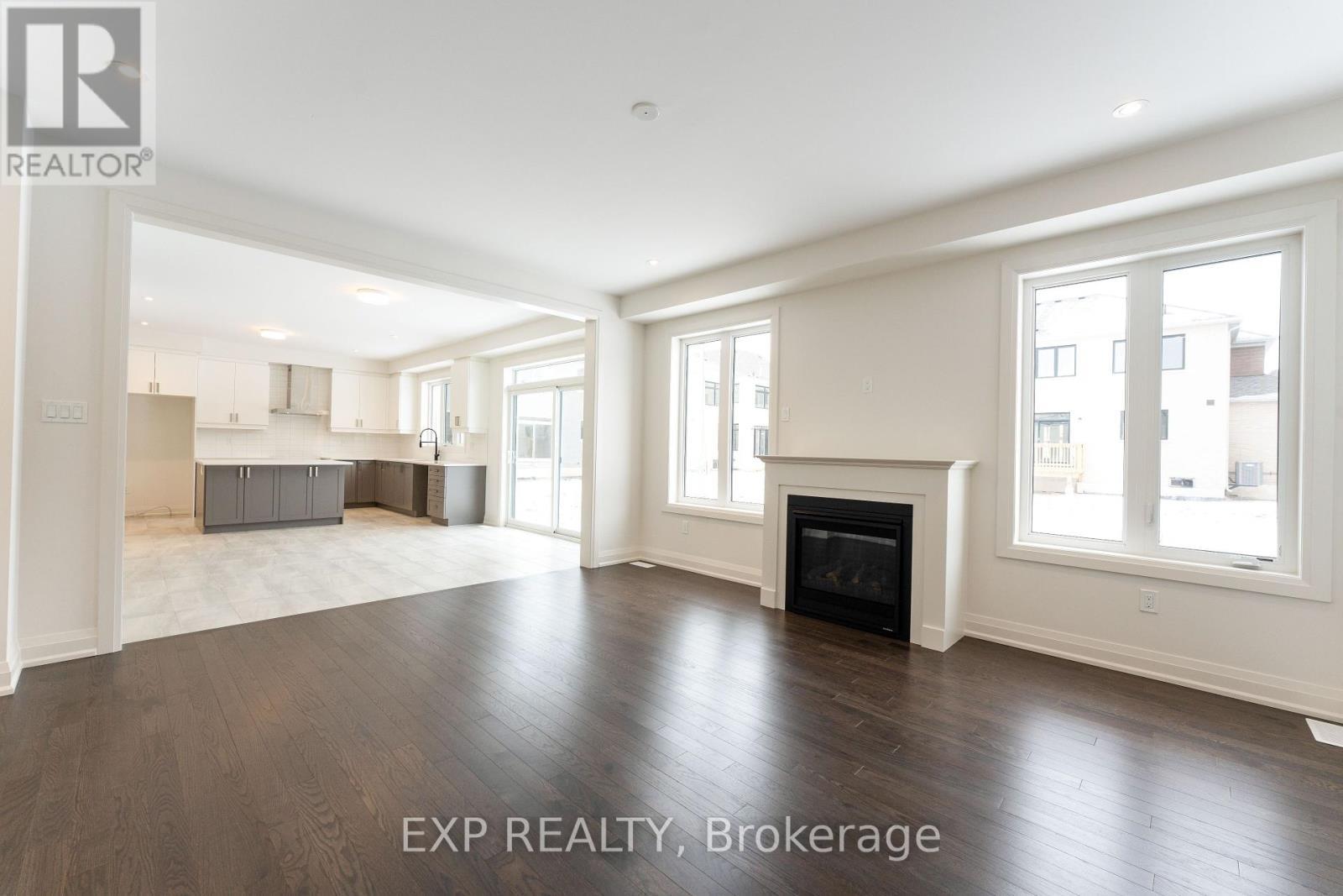 5 Mayflower Gardens, Adjala-Tosorontio, ON - Indoor Photo Showing Living Room With Fireplace