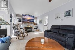 living room with gas fireplace -