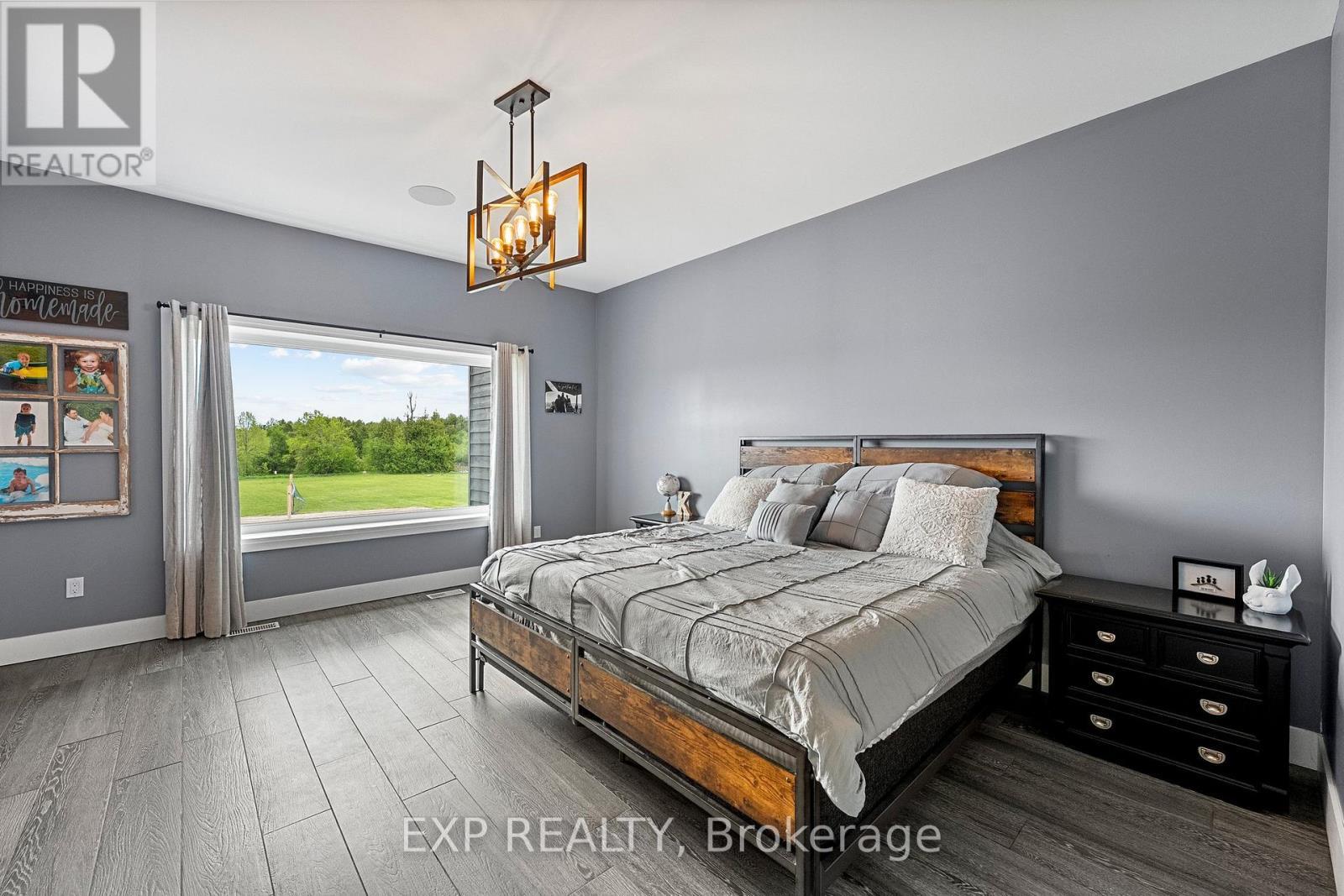 Main Floor Primary Suite - 1766 Concession 13 Road, Brock, ON - Indoor Photo Showing Bedroom