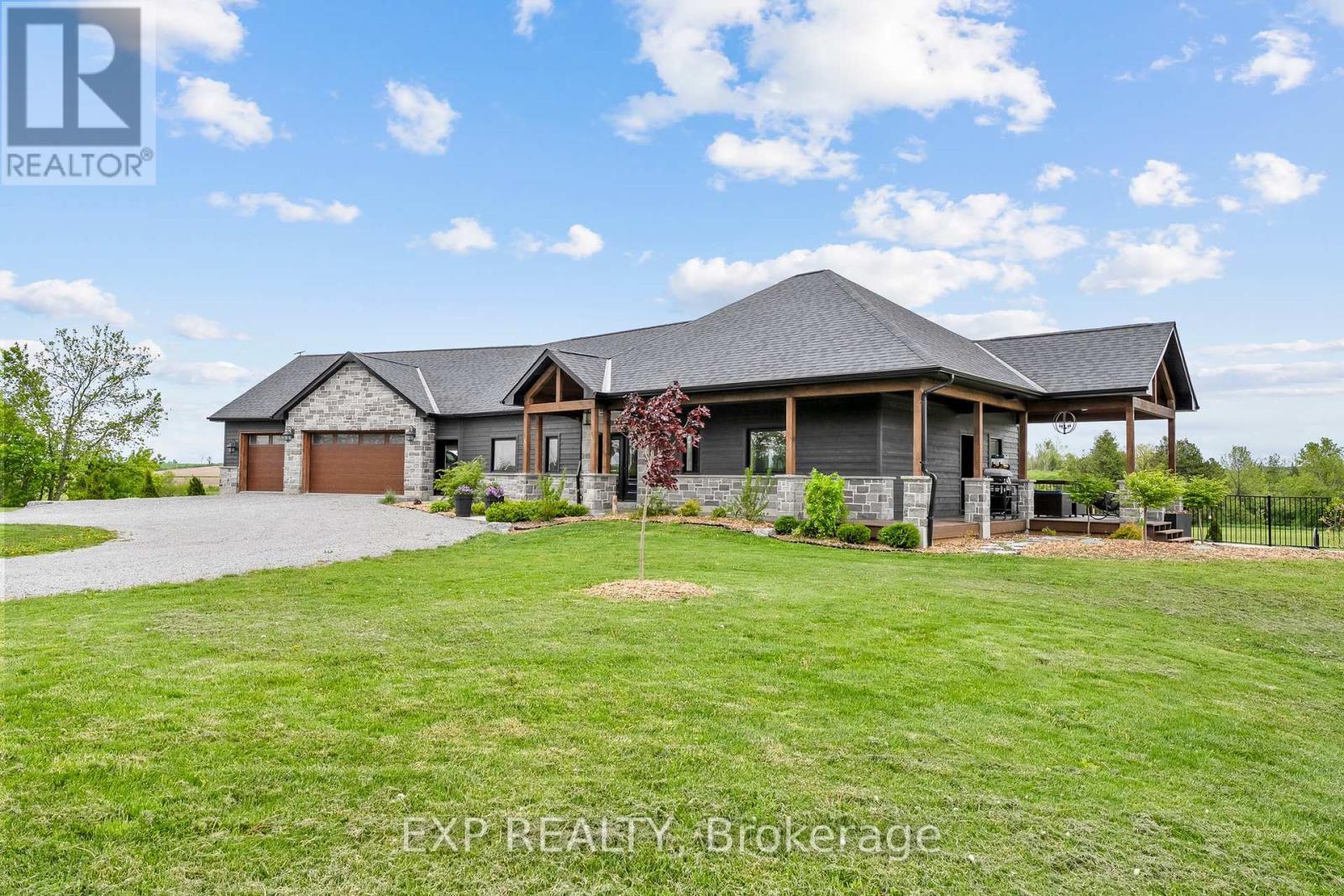 1766 Concession 13 Road, Brock, ON - Outdoor With Deck Patio Veranda With Facade